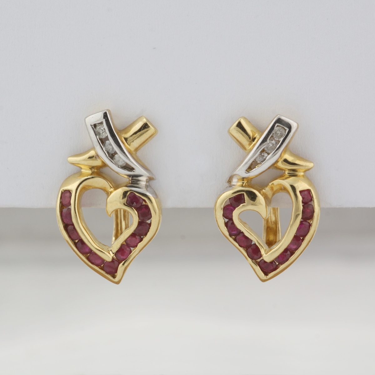 Pre-Owned 14 Karat Yellow and White Gold "X" and Heart Earrings
