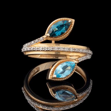 By-Pass Design 14K Blue Topaz and Diamond Ring