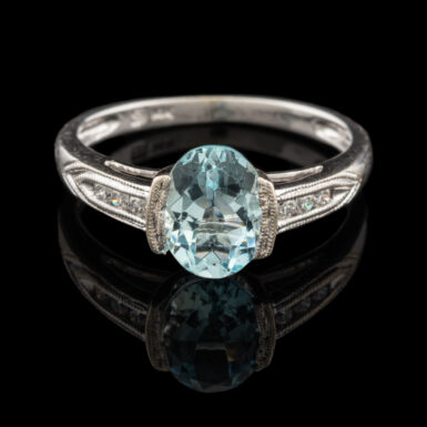 Pre-Owned Aquamarine and Diamond Ring in 14K