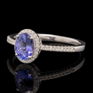 Tanzanite and Diamond Halo Style Ring in 18K