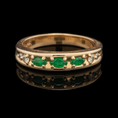 Pre-Owned Emerald and Diamond Band in 14K