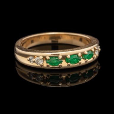 Pre-Owned Emerald and Diamond Band in 14K