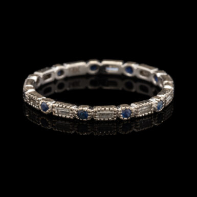 Pre-Owned Sapphire and Diamond Eternity Band in 14K